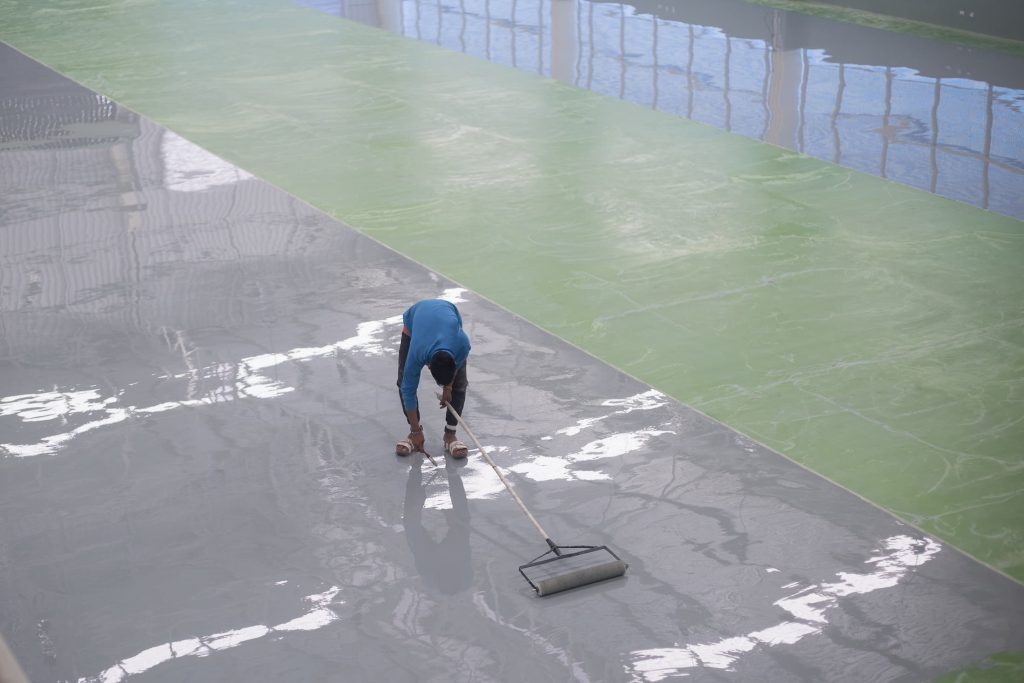 https://pmindustries.com.au/wp-content/uploads/2021/10/epoxy-flooring-applicator-1024x683.jpeg